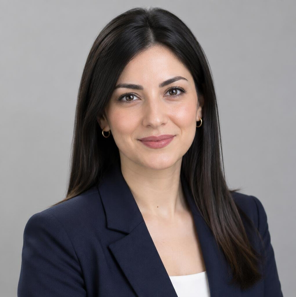 Woman with dark hair in a professional portrait